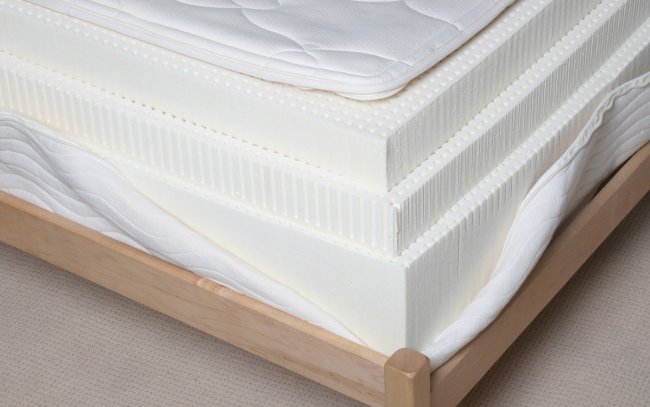 Detailed view of 12 inch latex mattress showing 3 layers of natural Talalay latex.