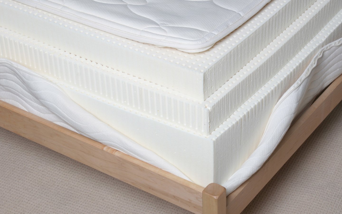 Detailed view of 12 inch latex mattress showing 3 layers of natural Talalay latex.
